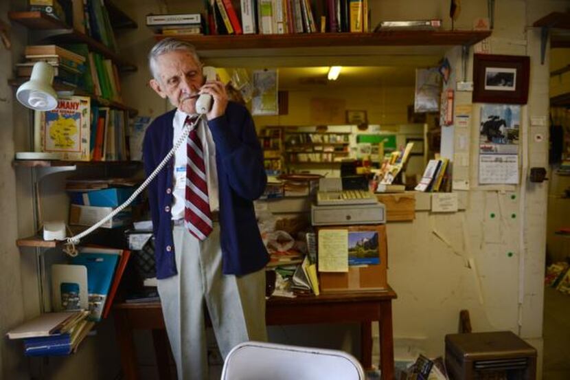 
Robert Jones answers a phone call at Imported Books.
