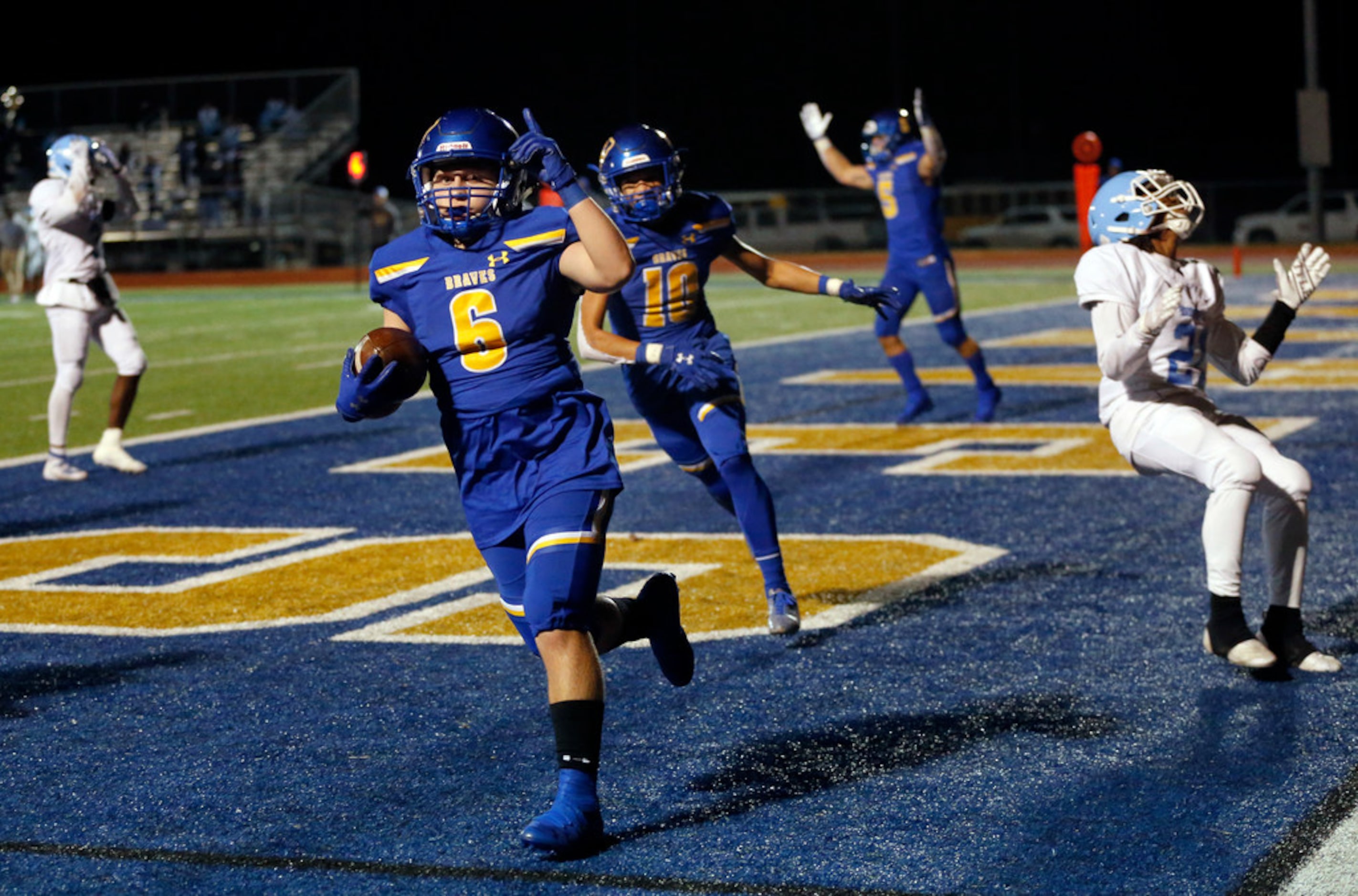 Community High running back Christian Williams scores a fourth quarter touchdown against ...