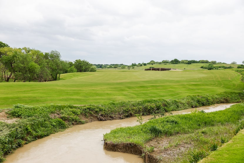 The view off the 18th green at the East Course at PGA Frisco, shot in Frisco on Monday, May...