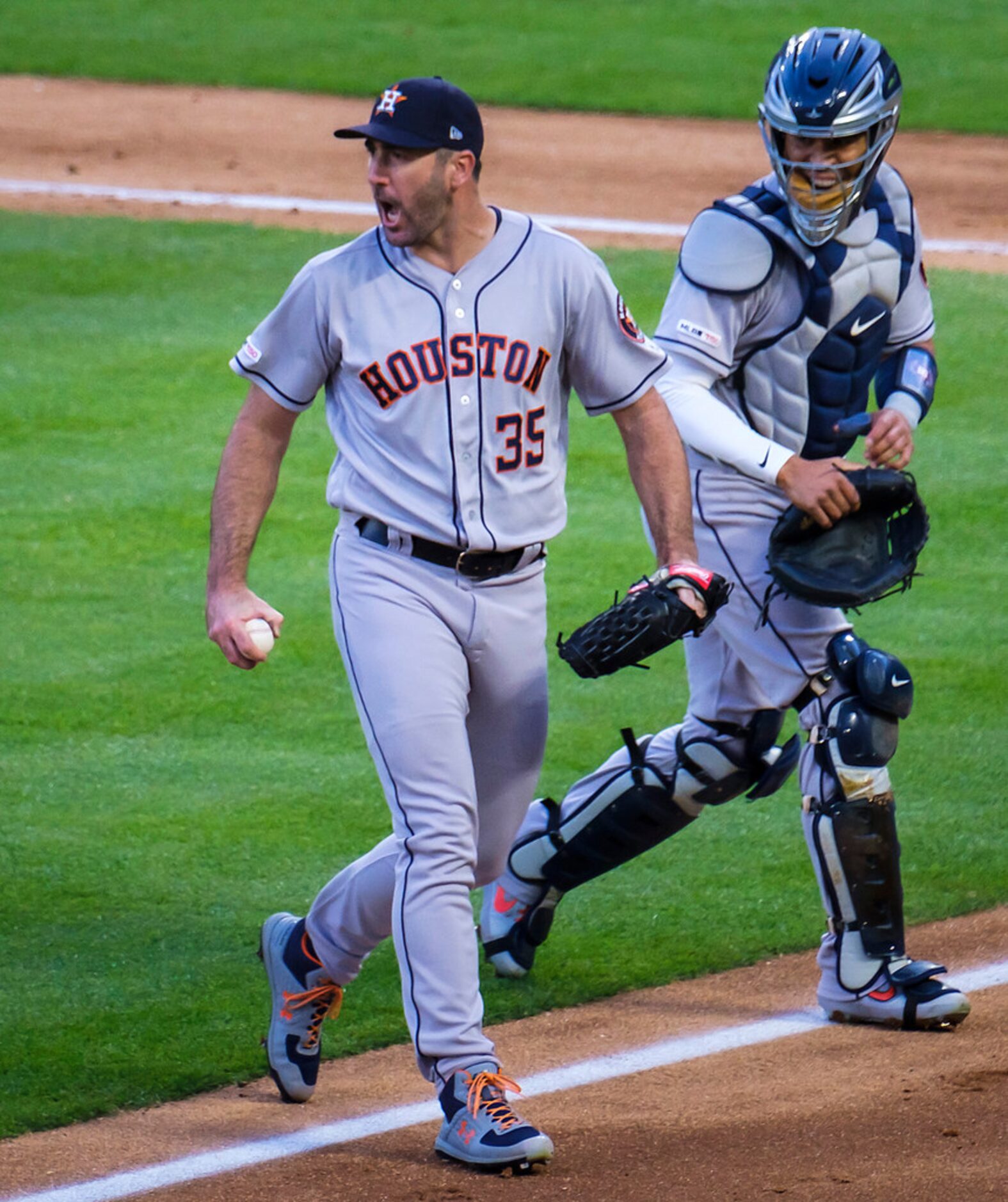 Houston Astros starting pitcher Justin Verlander and catcher Robinson Chirinos celebrate...