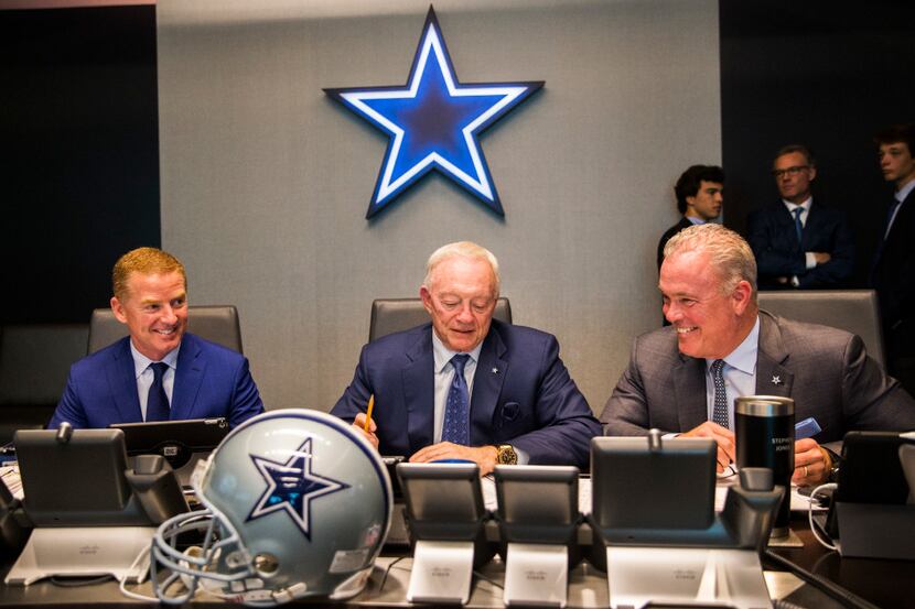 Dallas Cowboys head coach Jason Garrett, owner Jerry Jones and Executive Vice President and...
