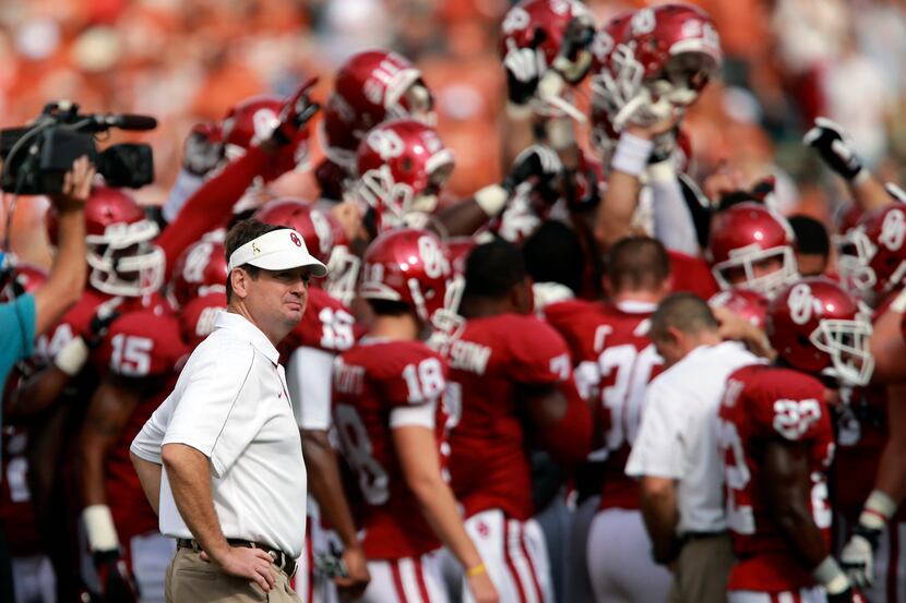 FILE - In this Oct. 13, 2012, file photo, Oklahoma head coach Bob Stoops looks on as his...