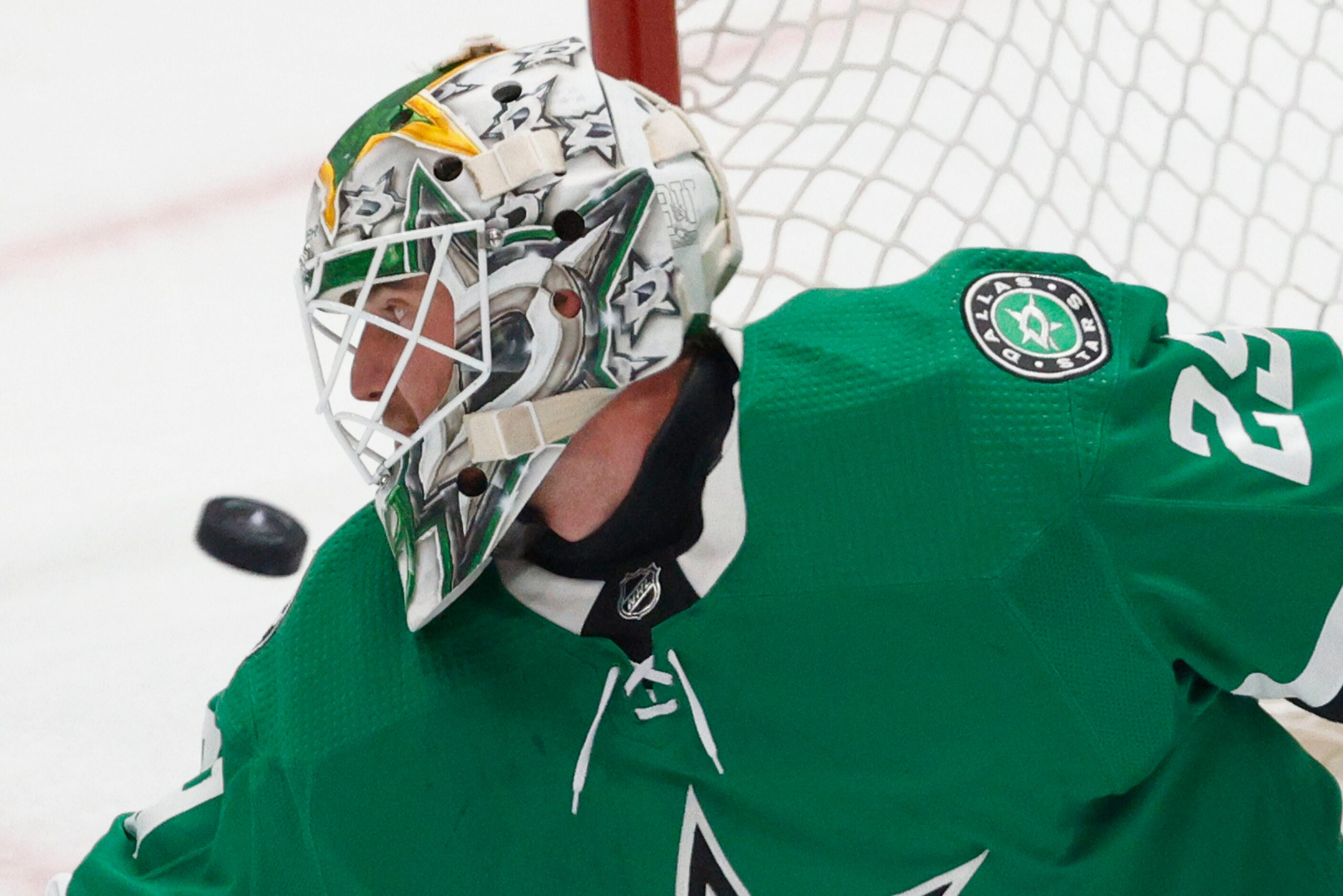 Dallas Stars goaltender Jake Oettinger (29) makes a save against Colorado Avalanche during...