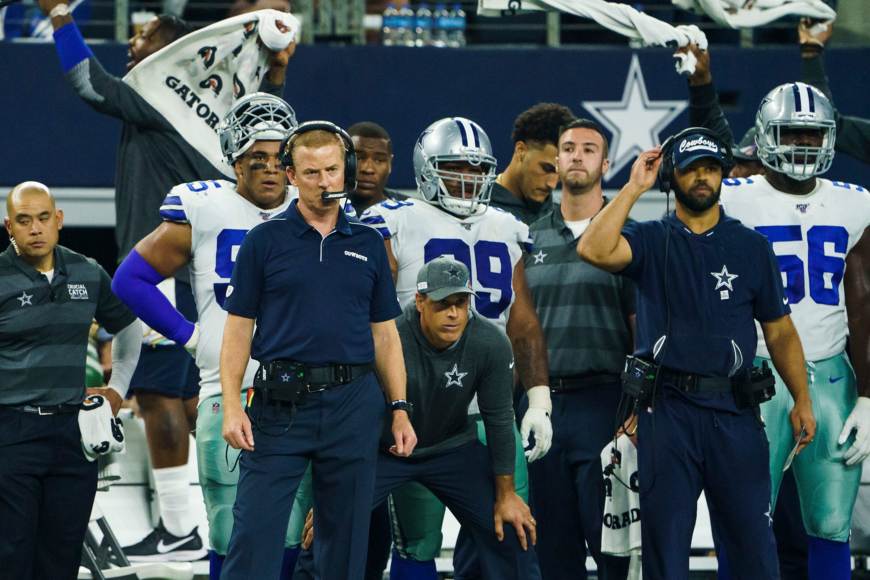 Dallas Cowboys head coach Jason Garrett watches as his team makes defensive stand during the...