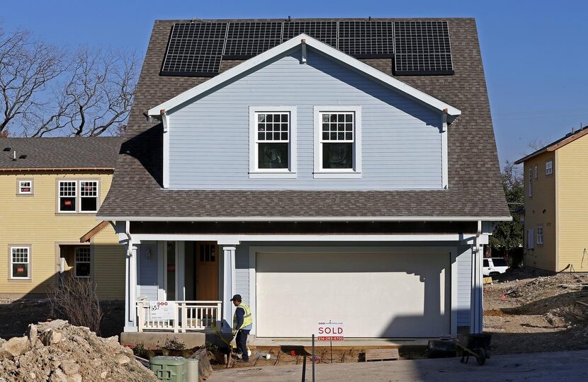 Domingo Rios does landscape work at a house in a new development in Kessler Stevens.