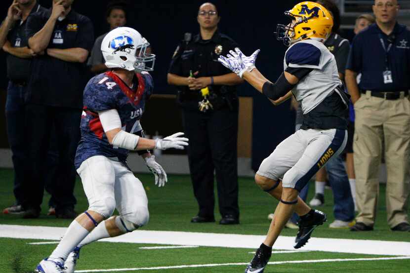 McKinney's Quinton Quirrenbach catches a touchdown pass with 12 seconds left in front of ...