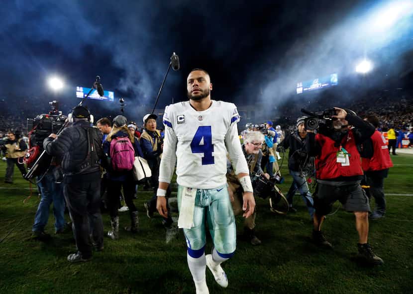 Dallas Cowboys quarterback Dak Prescott (4) leaves the field after losing to the Los Angeles...