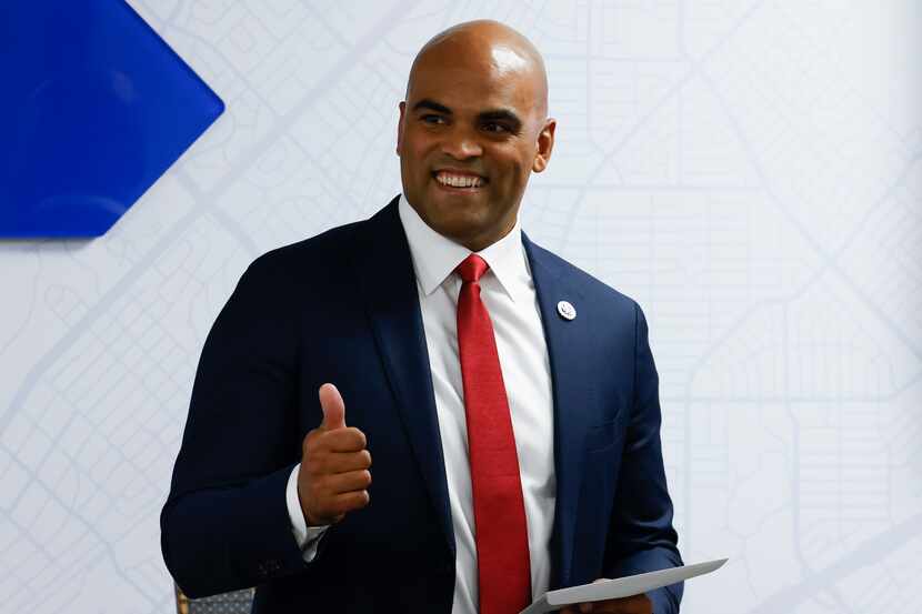 U.S. Rep. Colin Allred, D-Texas, gestures toward the crowd during an award presentation at...