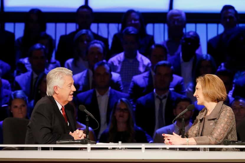 
Pastor Jack Graham (left) talks to Republican presidential candidate Carly Fiorina during...