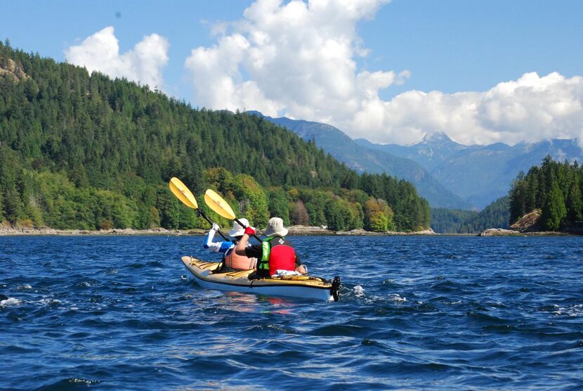 Kayakers paddle through  Whiterock Passage  on a day’s outing with Go With the Flow Kayak...