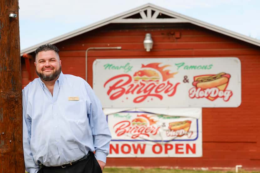Nearly Famous Burgers and Hotdogs owner Jeremy Lowe poses for a photo Dec. 13 in Arlington....