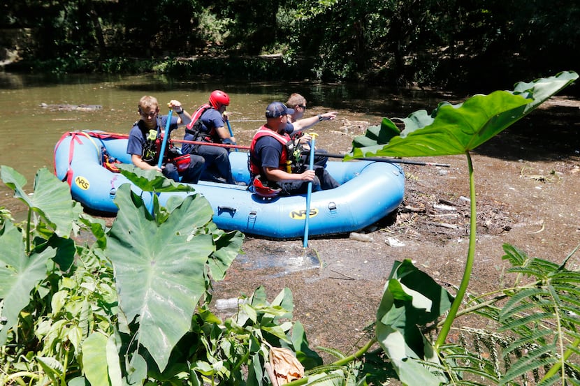 Dallas Swift Water Rescue searched the waters of Turtle Creek on July 7 for the body of...