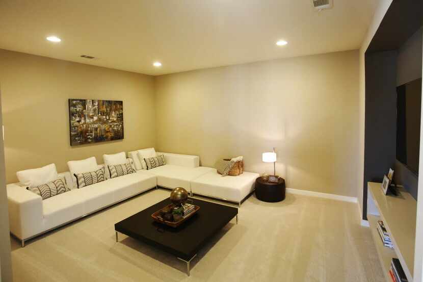 Theater room in the MainVue Homes Carmel Q1 model home at Phillips Creek Ranch in Frisco, on...