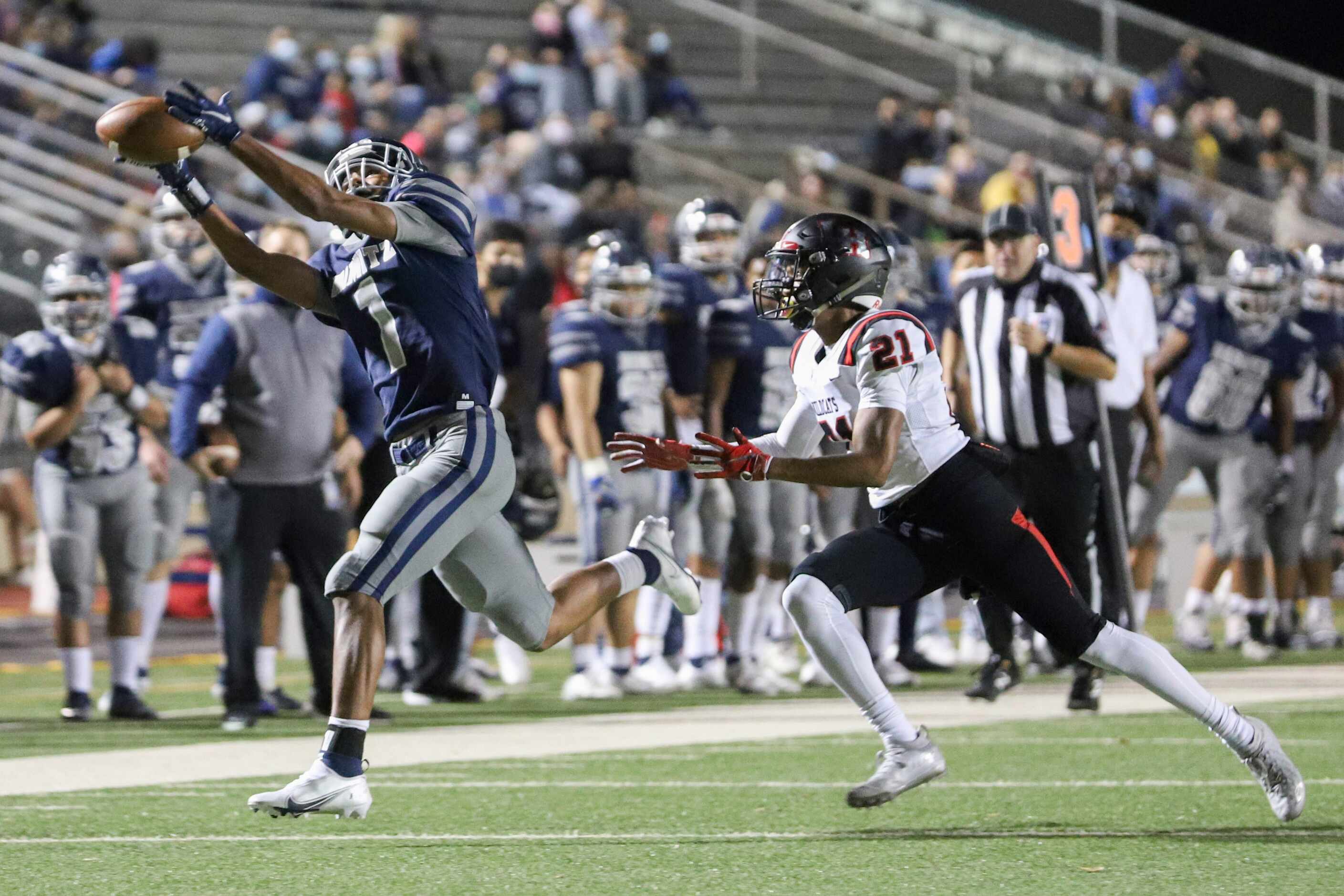 Irving Nimitz wide receiver Isaiah Gipson (1) drops a pass in front of Lake Highlands...