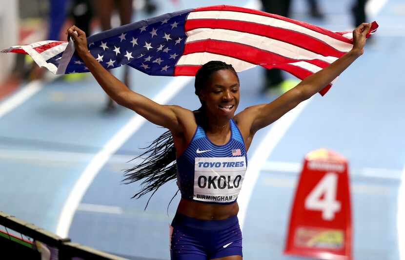 FILE - United States' Courtney Okolo celebrates winning the women's 400-meter final at the...