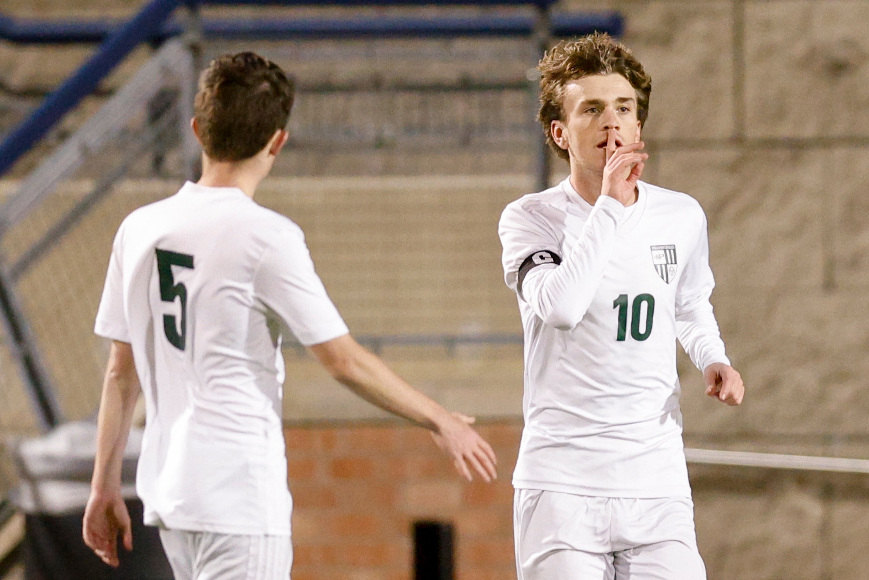 Prosper’s Caden Berg (10) celebrates after scoring a goal alongside Isaiah Spangler (5)...