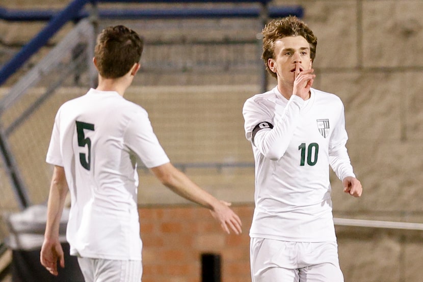 Prosper’s Caden Berg (10) celebrates after scoring a goal alongside Isaiah Spangler (5)...