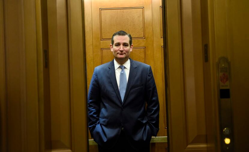  Republican presidential candidate, Sen. Ted Cruz, R-Texas, gets on an elevator on Capitol...