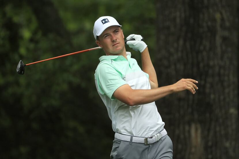 AUGUSTA, GEORGIA - APRIL 13: Jordan Spieth of the United States plays his shot from the...