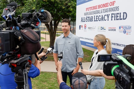 Texas Rangers pitcher Jacob deGrom speaks with reporters after a news conference to announce...