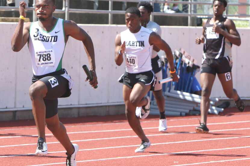 DeSoto's London Dunn was the first to the finish line as the final leg on the 6A Boys 4X100...