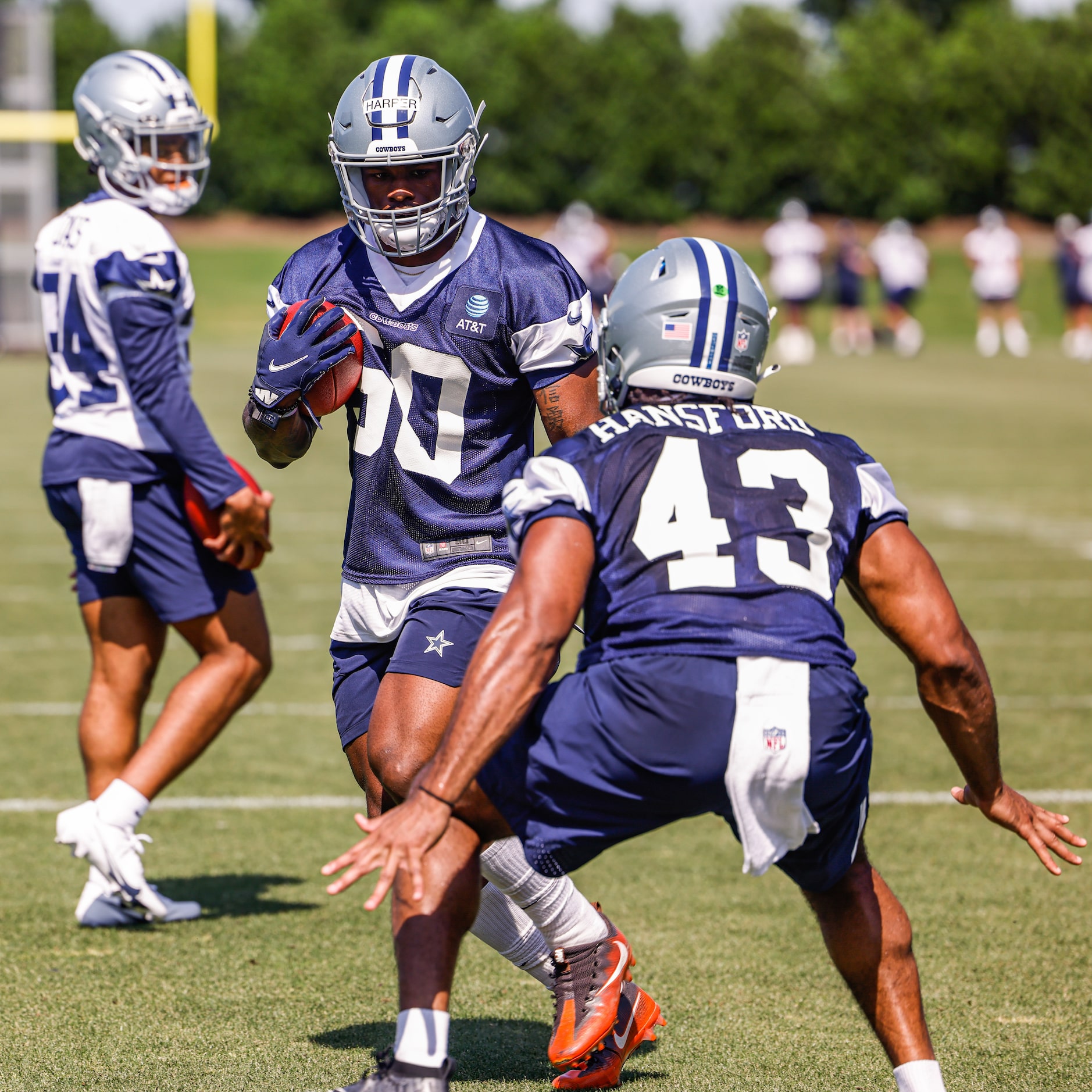 Dallas Cowboys linebacker (50) Devin Harper, linebacker (43) Aaron Hansford and defensive...