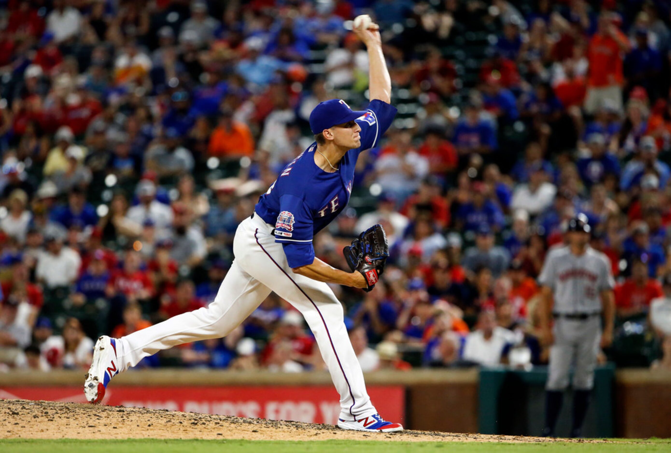 Texas Rangers starting pitcher Brett Martin (59) throws against the Houston Astros in the...