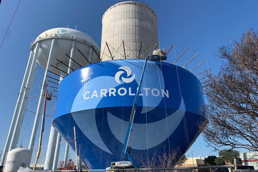 Engineering crews in Carrollton raised the bowl into its final position Friday at 2301 Josey...