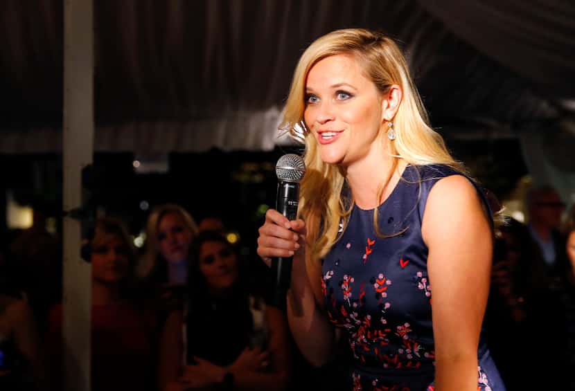 Oscar-winning actress Reese Witherspoon welcomes admirers to the grand opening of her Draper...