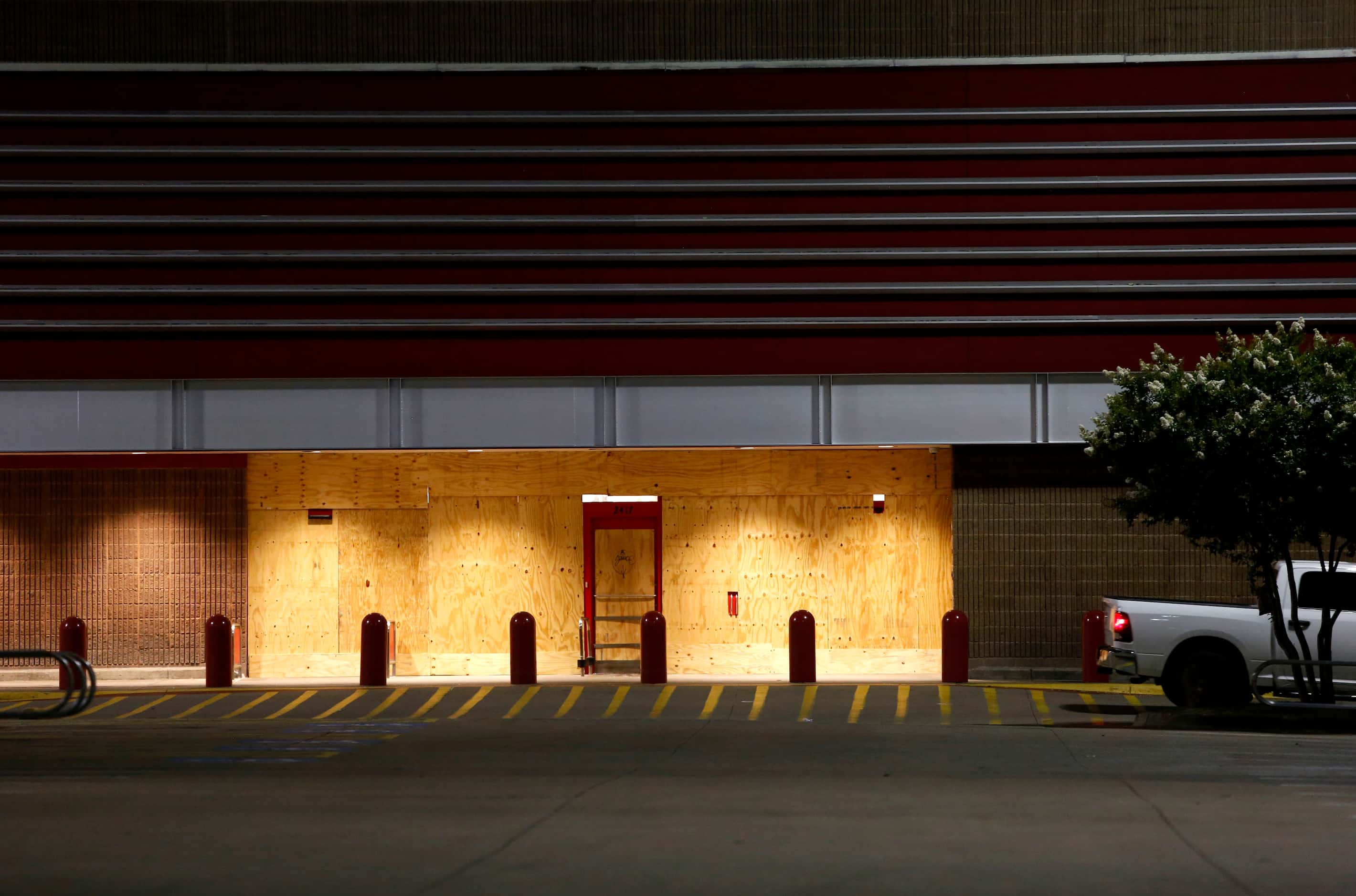 The Target Cityplace is closed and the doors boarded up in the wake of violent protests and...