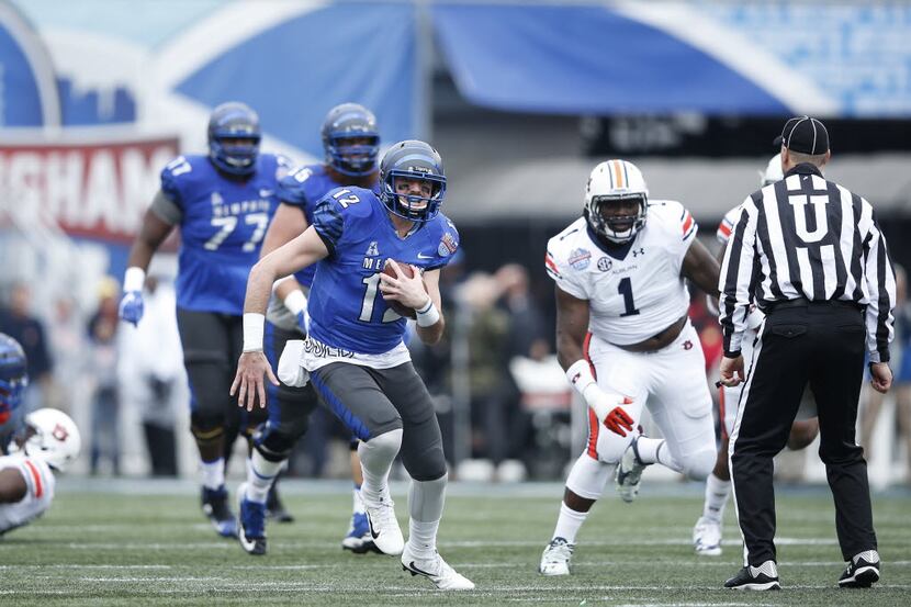 BIRMINGHAM, AL - DECEMBER 30: Paxton Lynch #12 of the Memphis Tigers runs with the ball...