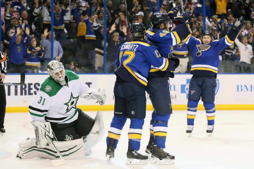 St. Louis Blues left wing Jaden Schwartz (17) celebrates with right wing David Backes (42)...
