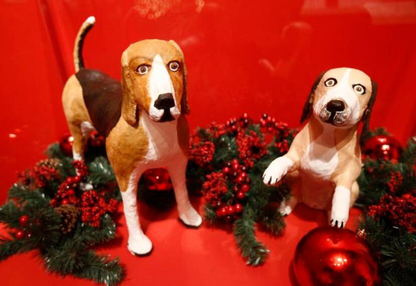
Papier-mâché replicas of Him and Her, two beagles owned by President Lyndon B. Johnson,...