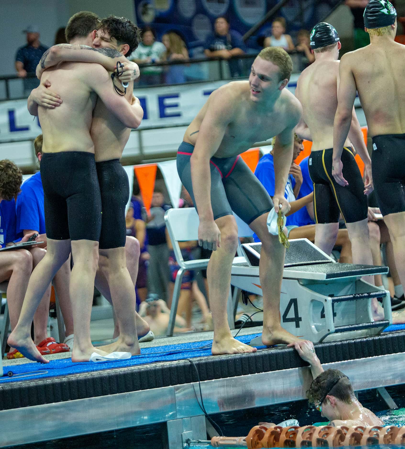 After breaking the national record in the boys 200-yard freestyle relay race Keller’s River...