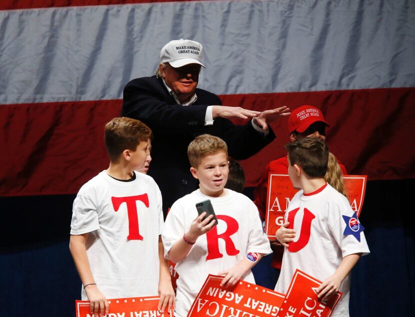 Children appeared onstage with Trump at a rally two days before Election Day at Freedom Hill...