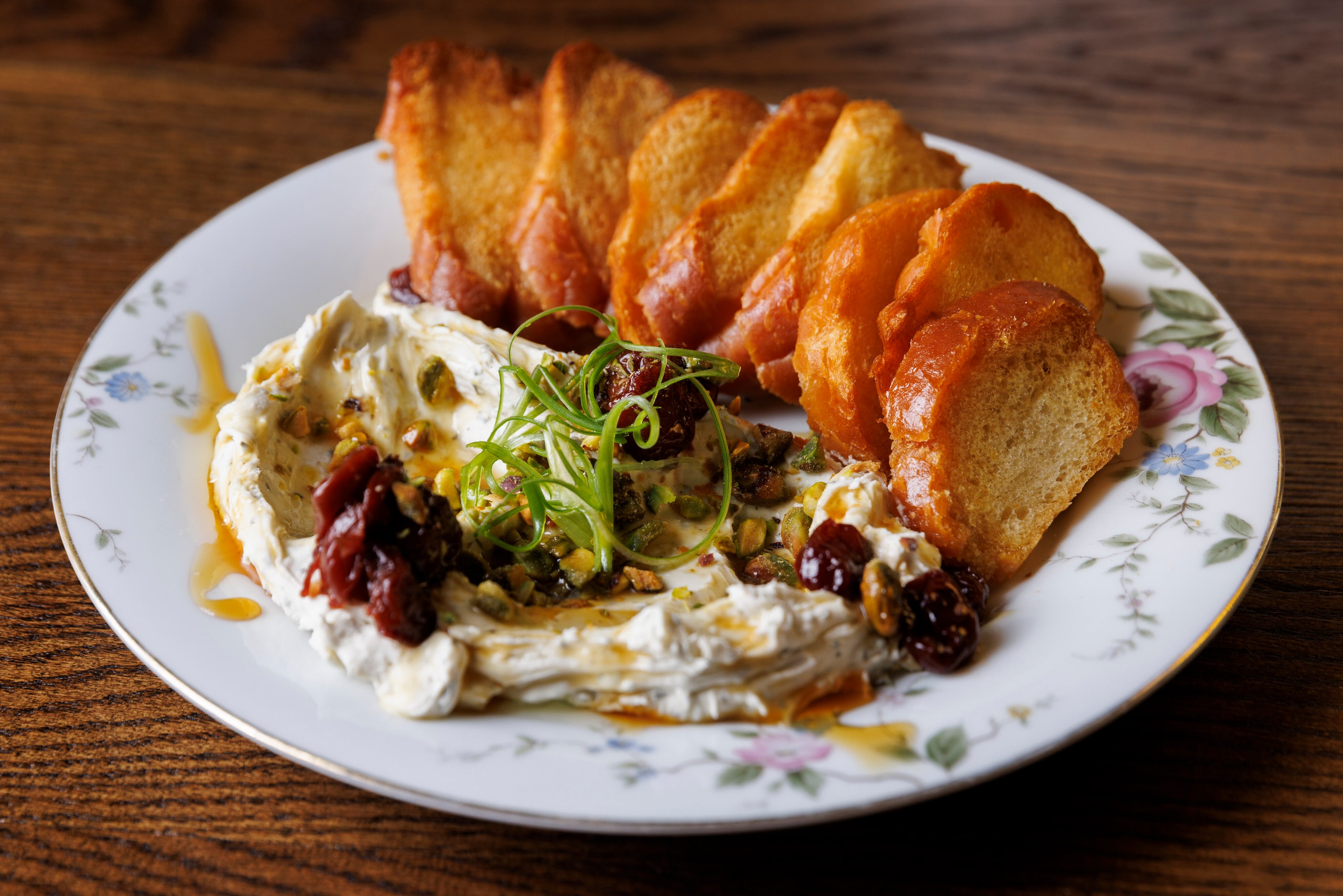 Herb whipped cream cheese is a shareable snack at Boxcar bar in Dallas.