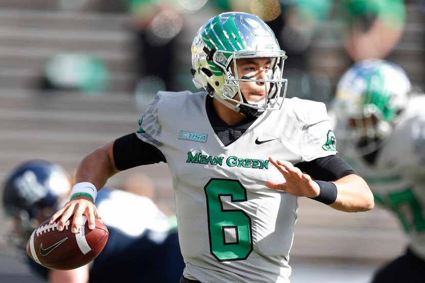 North Texas quarterback Mason Fine (6) looks to pass the ball in the first half of an NCAA...