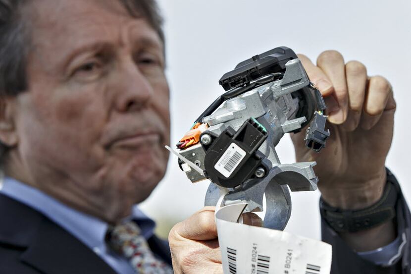 Clarence Ditlow, executive director of the Center for Auto Safety, displays a GM ignition...