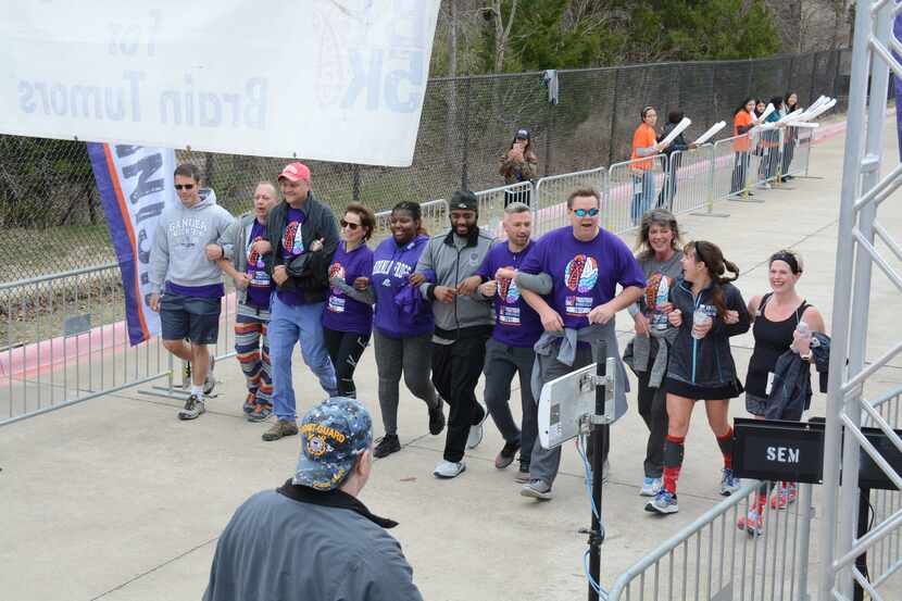 Brain tumor survivors wear gray and their support group purple at the annual American Brain...