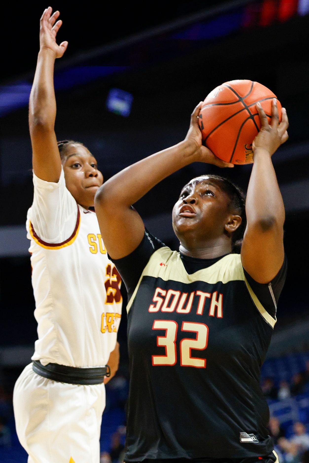 South Grand Prairie forward Cedraiah Peterson (32) attempts a layup against Humble Summer...