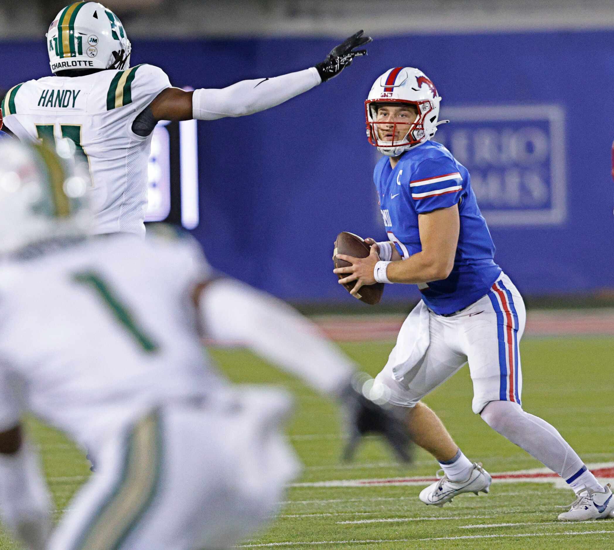 SMU quarterback Preston Stone (2) looks to throw the ball during the second half of an NCAA...