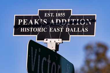 A neighborhood sign photographed in Peak's Suburban Addition in Dallas.