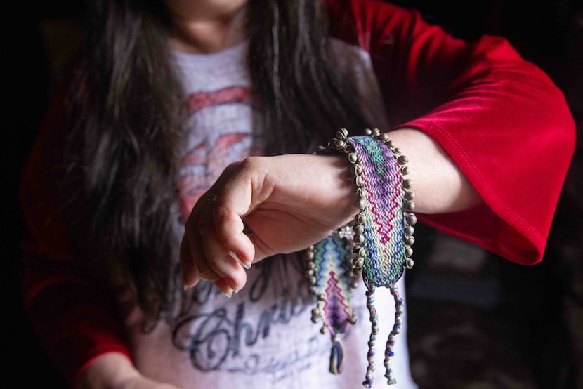 Sandra Meredith models the bracelet her best friend of over 20 years, Sonya Faith Warren,...