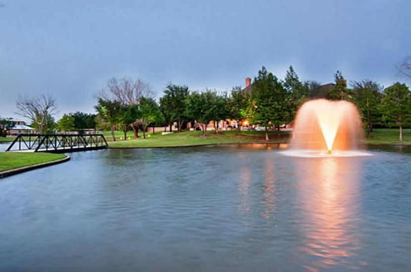 The backyard faces a private lake.