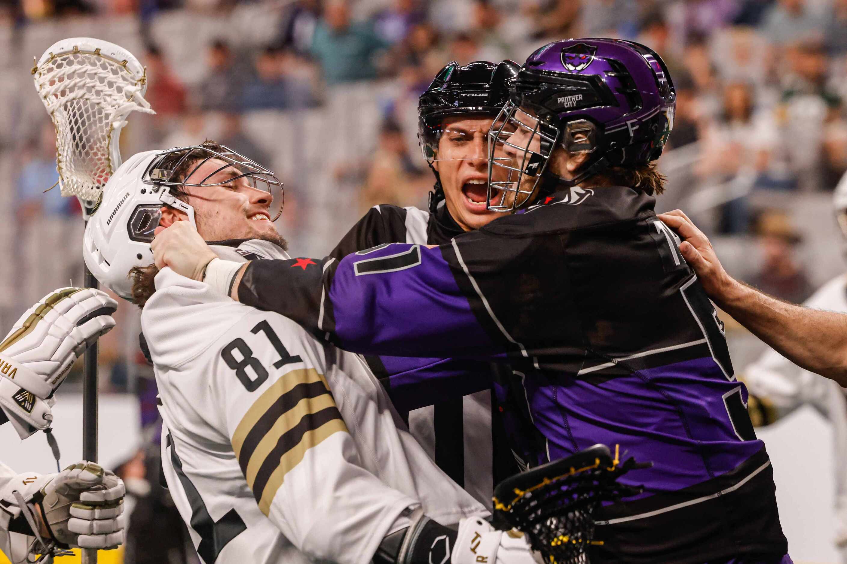 Panther City Dawson Theede (51) and Vancouver Warriors Anthony Kalinich (81) fight in the...