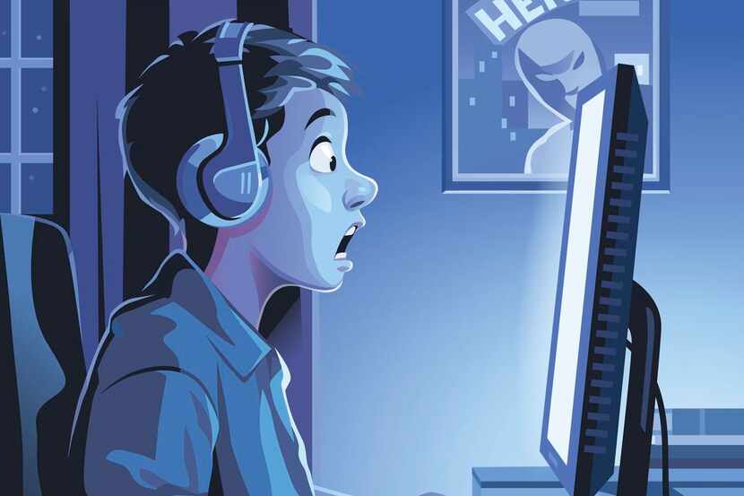 Un niño con audífonos jugando videojuegos en su computadora.(Getty Images)
