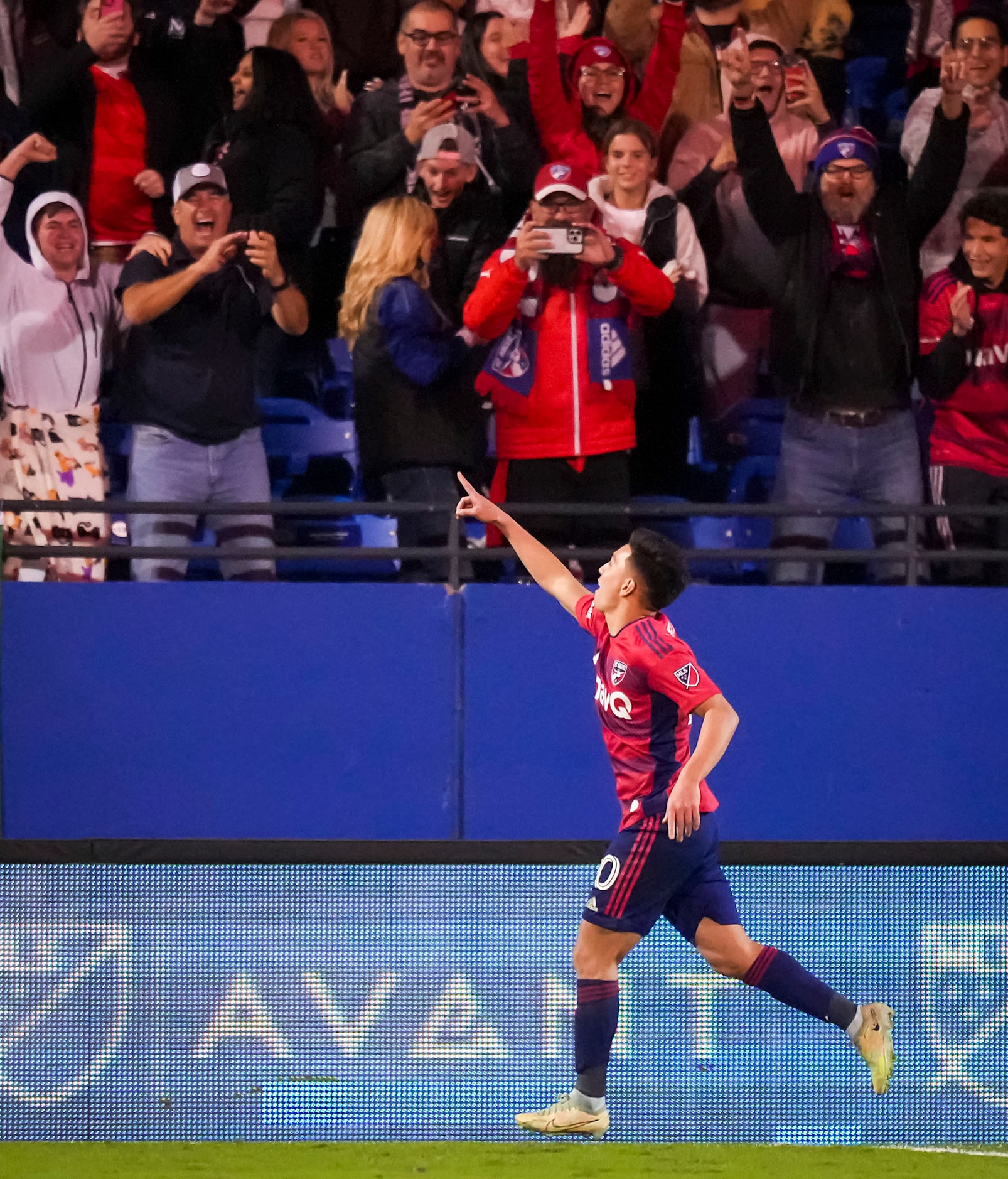 FC Dallas forward Alan Velasco (20) celebrates after scoring the game-winner during a...