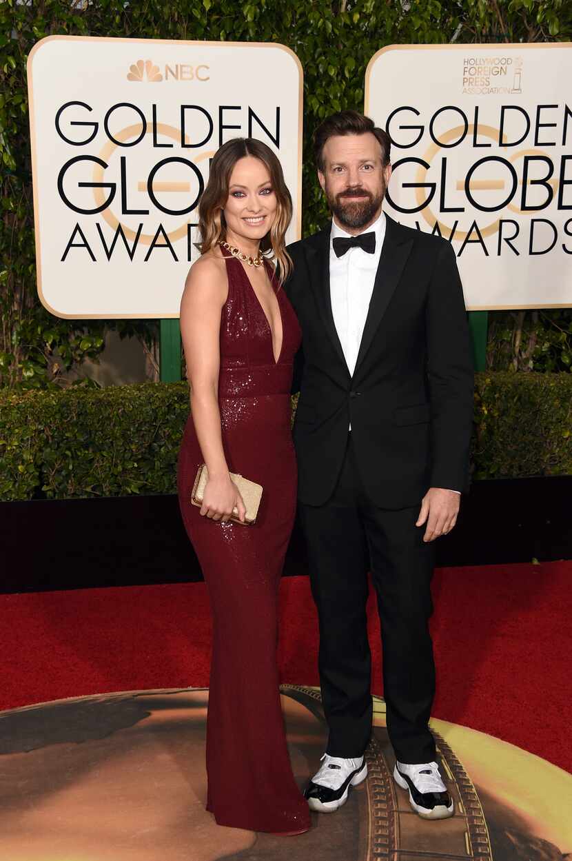 HIT: Olivia Wilde rocked the red carpet in Michael Kors - and her man doesn't look bad either!