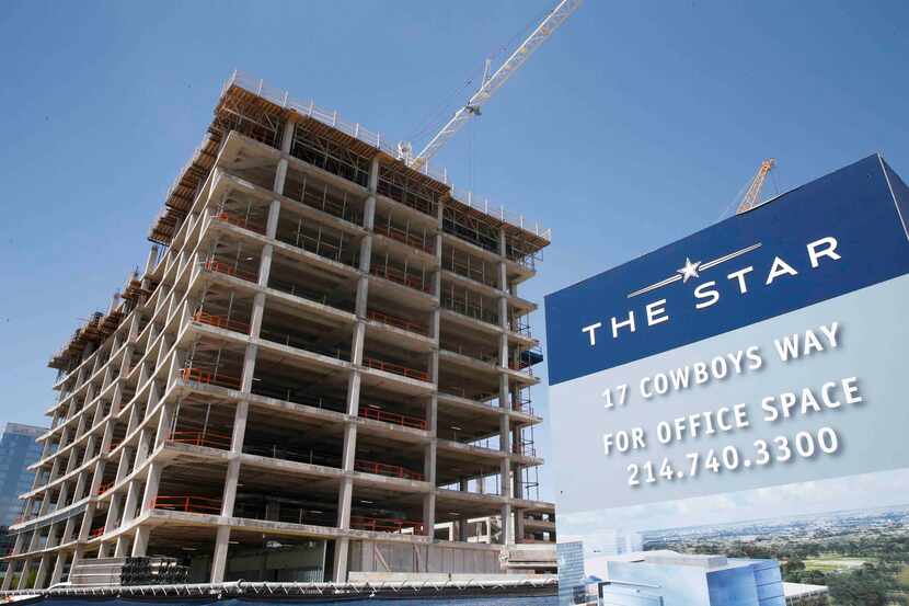 An 11-story office tower is  is already under construction on the west side of the Dallas...
