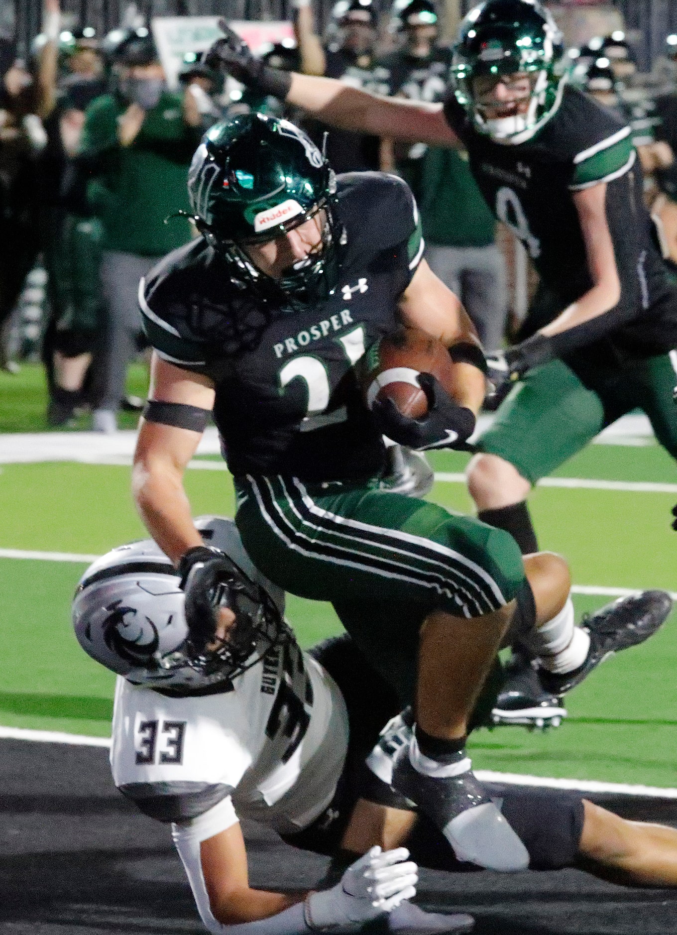 Prosper High School running back Keaton Nickerson (21) breaks into the end zone over Denton...